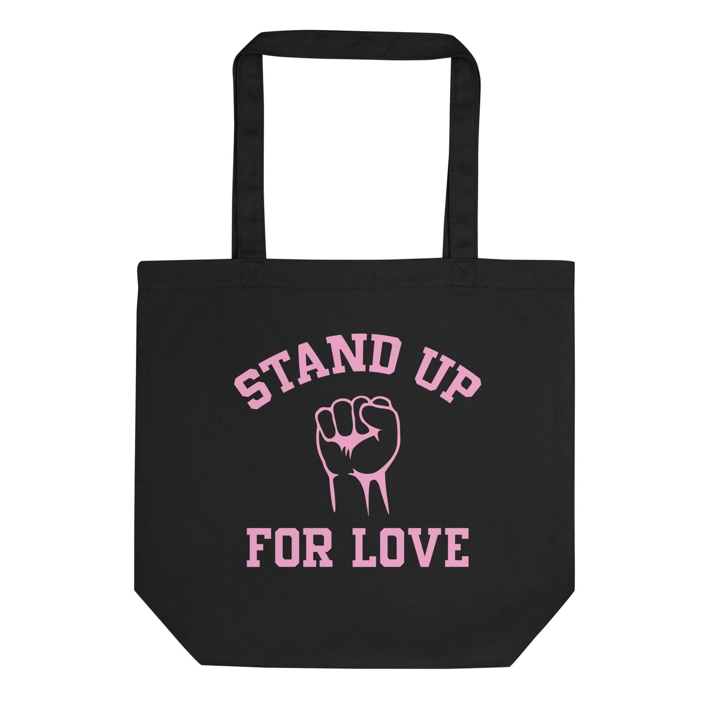 The Stand Up Tote Bag from Pridelity is a black tote adorned with pink text that reads "Stand Up for Love" and highlights a raised fist design in the center, making it ideal for showcasing your pride.