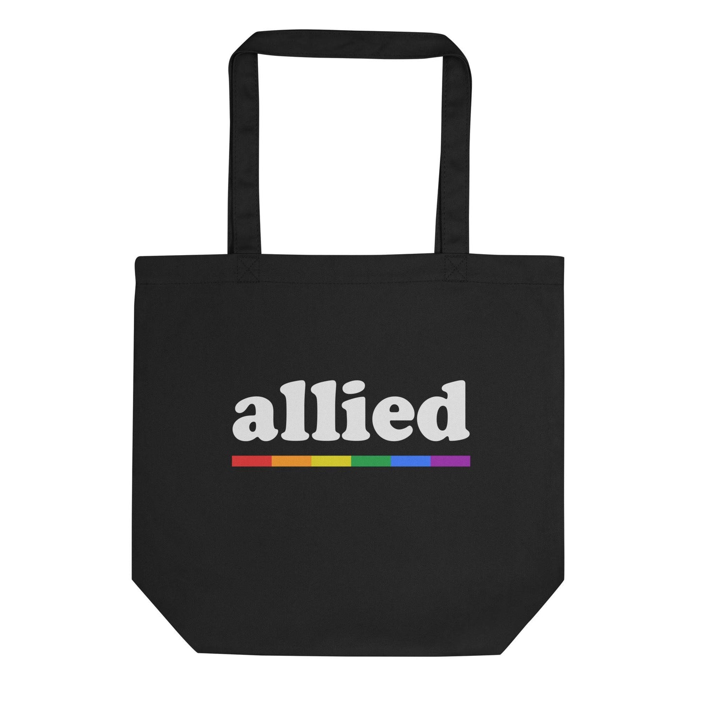 The Pridelity "Allied Tote Bag" is a black tote with long handles, showcasing the word "allied" in white with a horizontal rainbow stripe beneath it, making it a stylish addition to any Pride Collection.