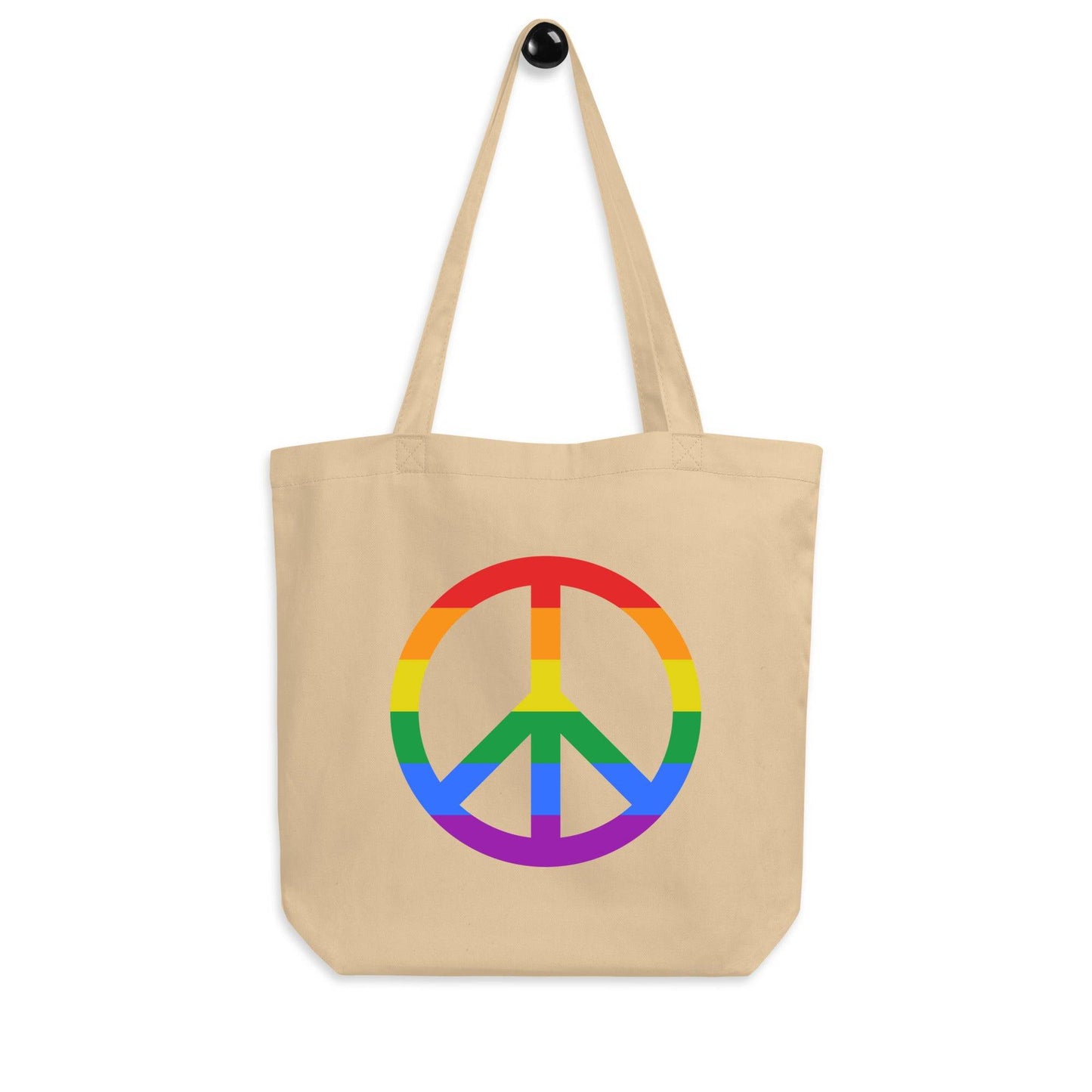 Introducing the Peace Tote Bag by Pridelity, a sleek black tote adorned with a captivating rainbow-colored peace sign at its center and vibrant horizontal stripes. Featuring two comfortable shoulder straps, it's perfect for everyday use and available exclusively at Rainbow Store.