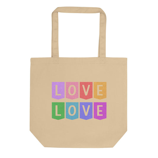 A black Love Tote Bag by Pridelity features the word "LOVE" repeated in bold letters, each letter housed in a block of vibrant pink, orange, yellow, green, blue, and purple colors—truly a stunning rainbow display.