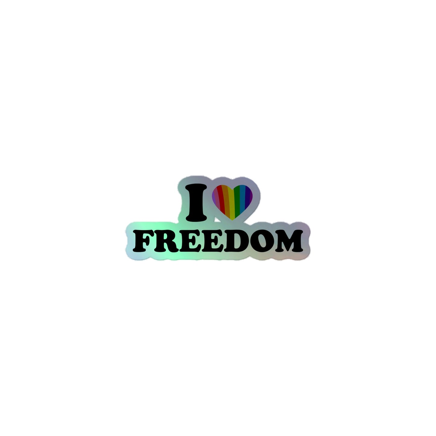Introducing the I Love Freedom Holo Sticker by Pridelity. This eye-catching design features bold text reading "I ♥ FREEDOM," with a heart filled with vibrant rainbow colors that symbolize diversity and inclusivity, set against a clean white background. It's the ideal pride merchandise for those who wish to celebrate love and liberation.