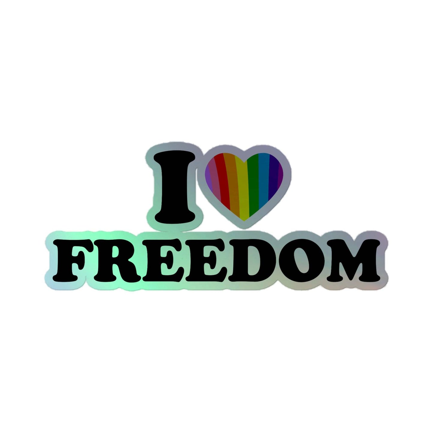 Introducing the I Love Freedom Holo Sticker by Pridelity. This eye-catching design features bold text reading "I ♥ FREEDOM," with a heart filled with vibrant rainbow colors that symbolize diversity and inclusivity, set against a clean white background. It's the ideal pride merchandise for those who wish to celebrate love and liberation.