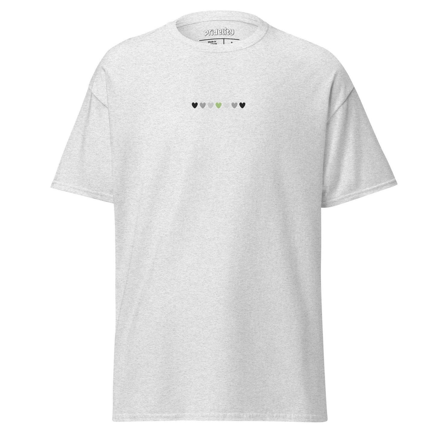 The Agender Love T-Shirt, by Pridelity, showcases a blue design with a small row of multicolored heart-shaped motifs across the chest, embodying the spirit of Pride. The brand name "Pridelity" is elegantly displayed on the inside label at the collar, making it an essential addition to any Pride Collections wardrobe.