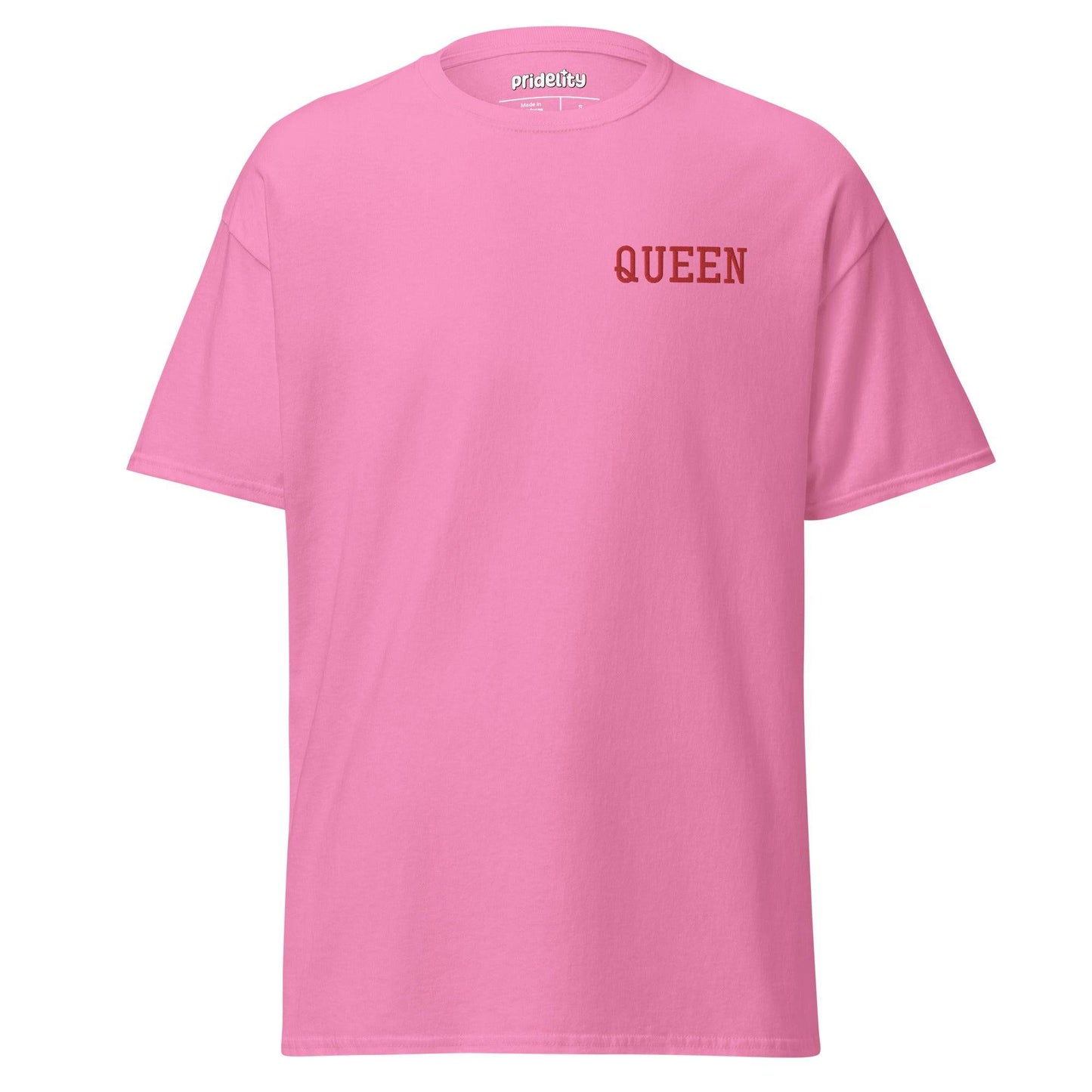 The Pridelity Queen T-Shirt adds a vibrant flair to its simple white design with the word "QUEEN" prominently displayed in bold red uppercase letters on the upper left chest.