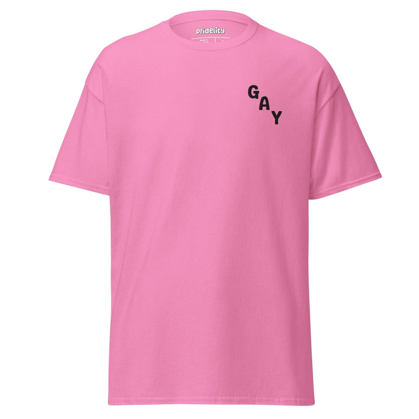A charcoal T-shirt from Pridelity's pride collection prominently displays "GAY" in bold black letters arranged diagonally on the upper left side.