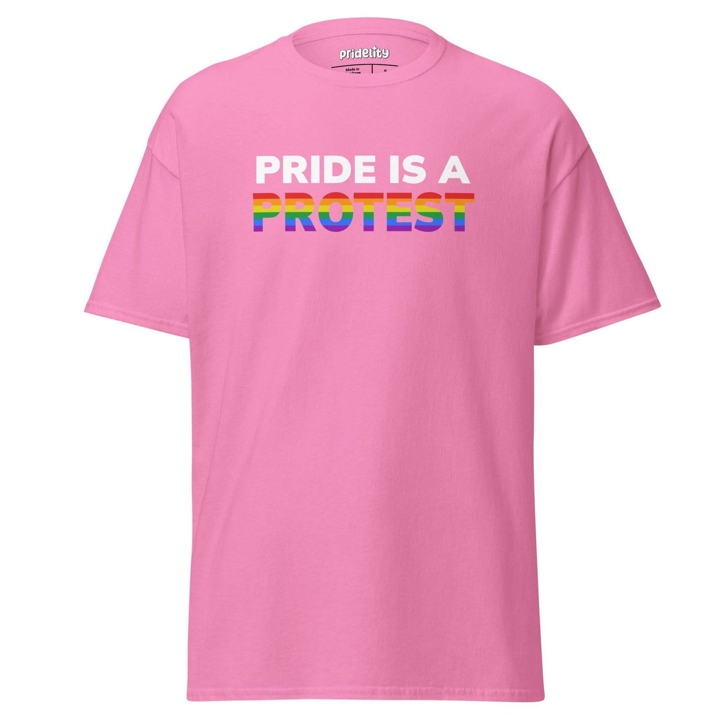 The Pride is a Protest T-Shirt by Pridelity prominently displays "PRIDE IS A PROTEST" in striking white and colorful rainbow hues on a black background.