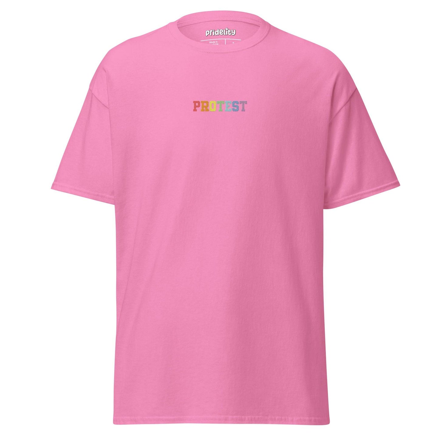 The Protest T-Shirt by Pridelity is a bold black garment featuring the word "PROTEST" displayed prominently in vibrant rainbow-colored letters on the chest, set against a plain white background.