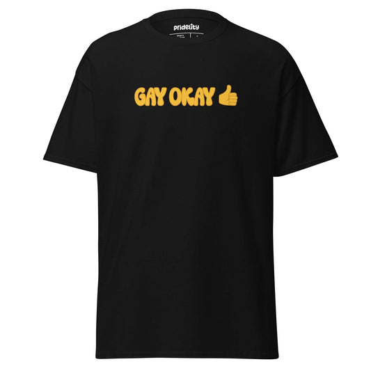 A black T-shirt with the phrase "GAY OKAY" printed prominently in vivid yellow letters, alongside a yellow thumbs-up emoji. The brand name "Pridelity" is stylishly featured on the inside label at the neckline, making it an ideal addition to this year's pride collections.
