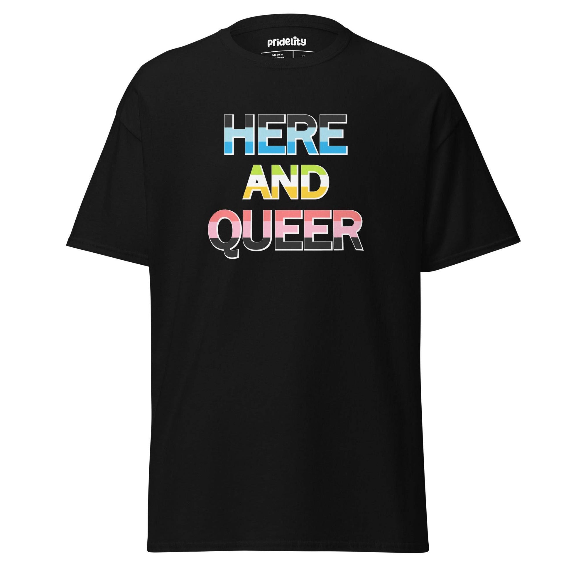 The Pridelity "Here And Queer" T-shirt showcases bold, block letters filled with the vibrant light blue, pink, and white of the transgender pride flag against a classic black background. Make a statement with this eye-catching item from our pride collection.