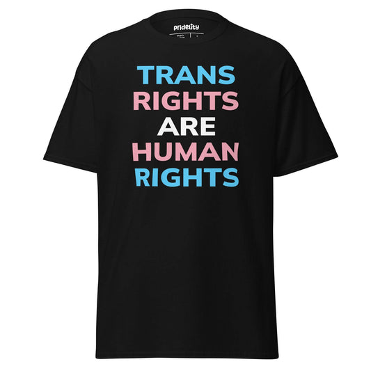 A Pridelity Trans Rights T-Shirt in black, featuring the phrase "Trans Rights Are Human Rights" in bold letters adorned with light blue, pink, and white colors.