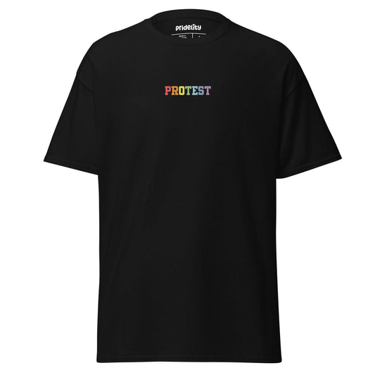 The Protest T-Shirt by Pridelity is a bold black garment featuring the word "PROTEST" displayed prominently in vibrant rainbow-colored letters on the chest, set against a plain white background.