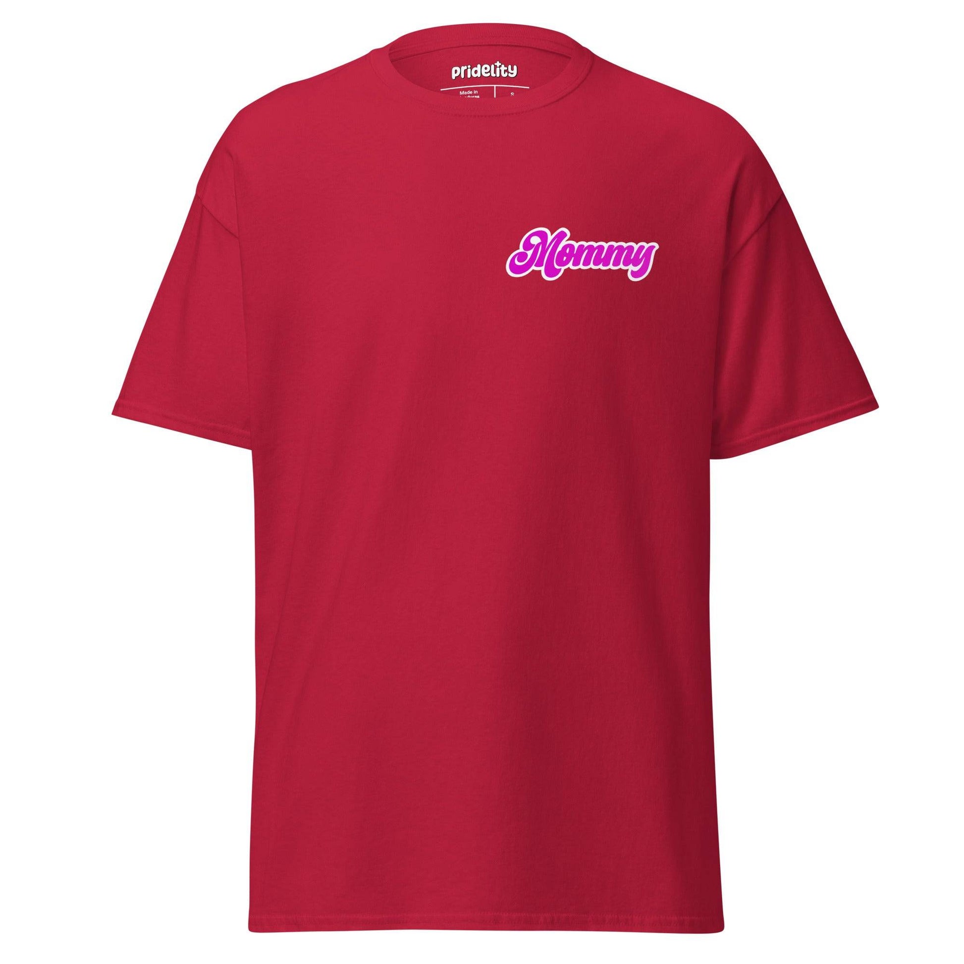 A Pridelity "Mommy" T-Shirt in purple with "Mommy" gracefully printed in pink, cursive font on the upper left chest.