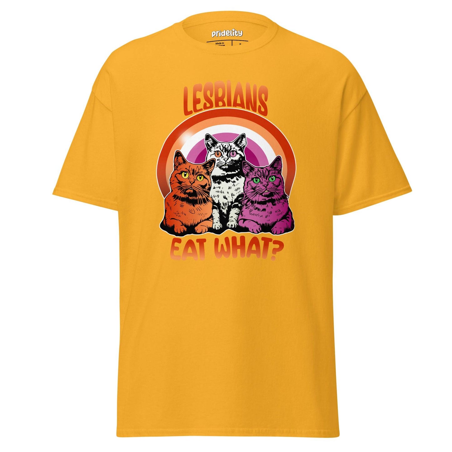 Introducing the Pridelity "Lesbians Eat What T-Shirt," a black pride shirt showcasing vibrant artwork of three cats seated in front of a rainbow with the bold, humorous text "LESBIANS EAT WHAT?