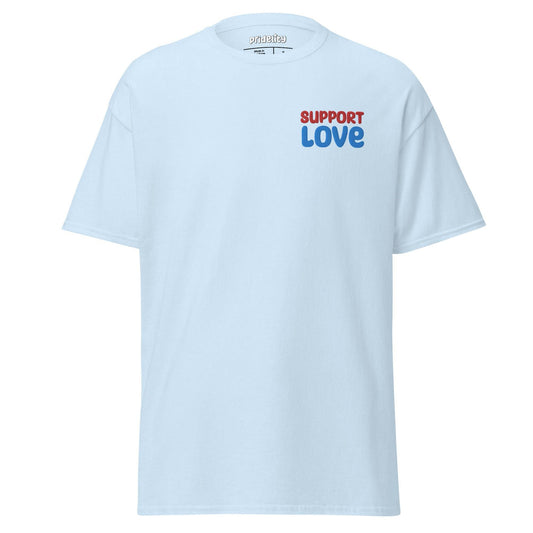 Light blue Support Love T-Shirt by Pridelity showcasing "SUPPORT LOVE" prominently printed on the front in striking red and blue font.