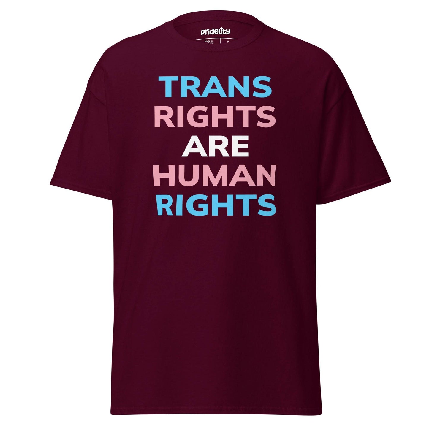 A Pridelity Trans Rights T-Shirt in black, featuring the phrase "Trans Rights Are Human Rights" in bold letters adorned with light blue, pink, and white colors.