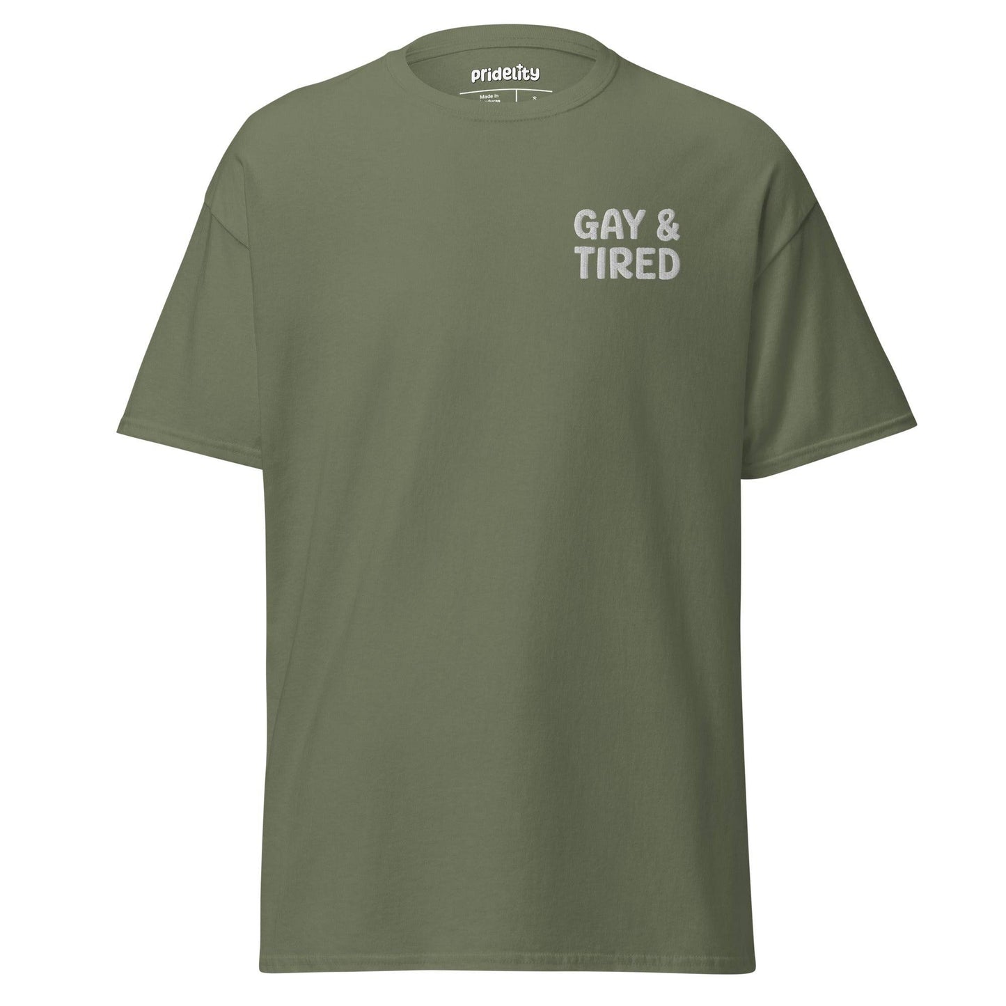 Pridelity's Gay & Tired T-Shirt, available in black, showcases the phrase "GAY & TIRED" in white letters on the upper left side of the front.