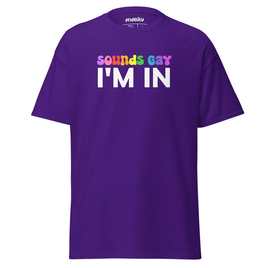 Introducing the "Sounds Gay T-Shirt" by Pridelity, a black tee showcasing the phrase "sounds gay I'M IN." The word "gay" is vibrantly highlighted in rainbow colors, while the rest of the text stays in a clean white.