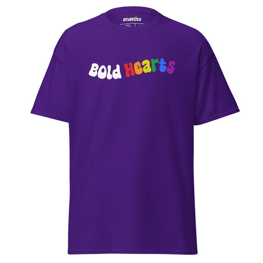 Introducing the "Bold Hearts T-Shirt" by Pridelity: a vibrant black t-shirt from our Pride Collection, showcasing the playful text "Bold Hearts." Each letter explodes with a unique color—white, red, orange, yellow, green, and purple—celebrating individuality and love.