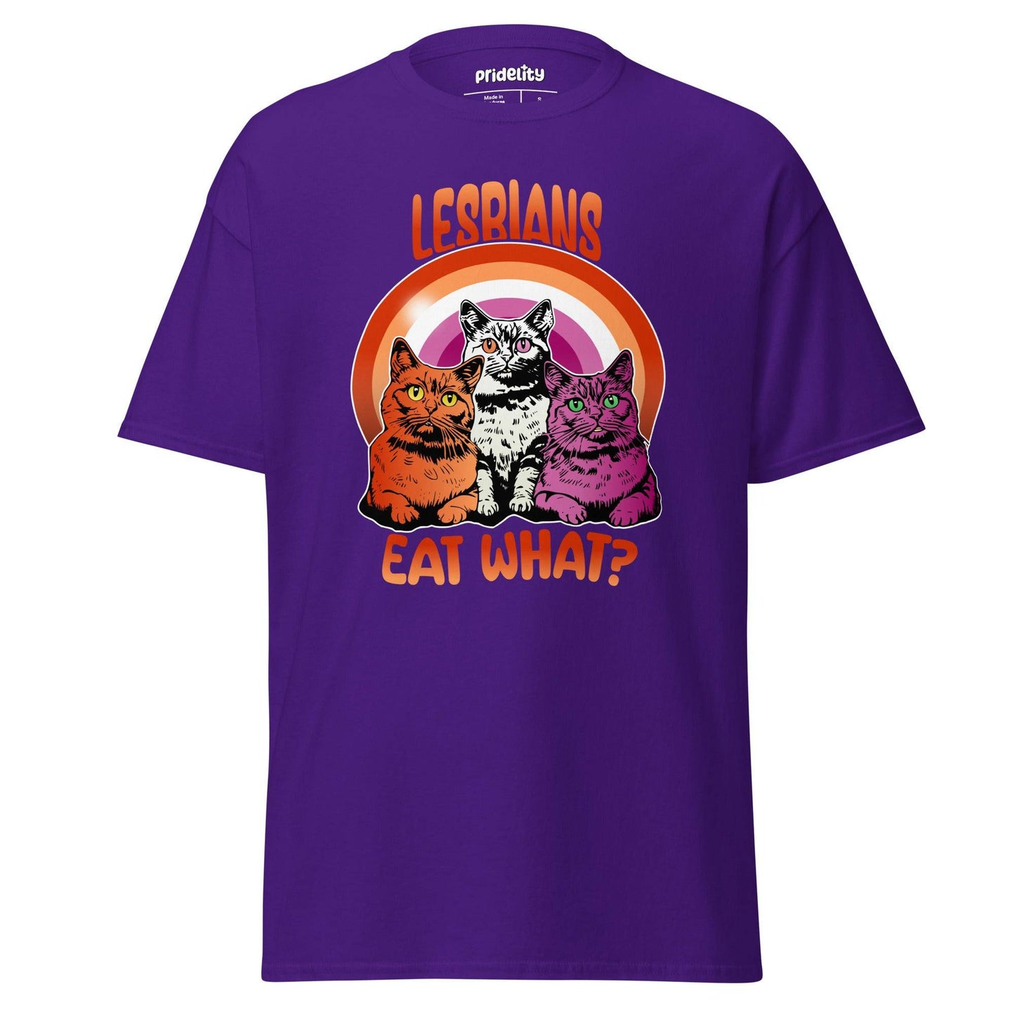 Introducing the Pridelity "Lesbians Eat What T-Shirt," a black pride shirt showcasing vibrant artwork of three cats seated in front of a rainbow with the bold, humorous text "LESBIANS EAT WHAT?