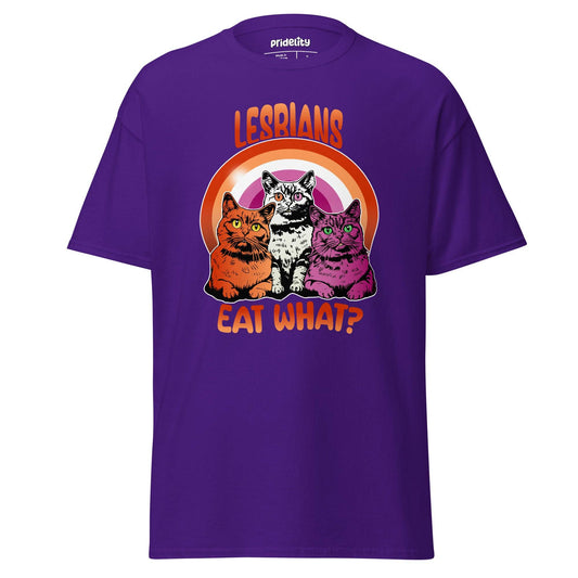 Introducing the Pridelity "Lesbians Eat What T-Shirt," a black pride shirt showcasing vibrant artwork of three cats seated in front of a rainbow with the bold, humorous text "LESBIANS EAT WHAT?