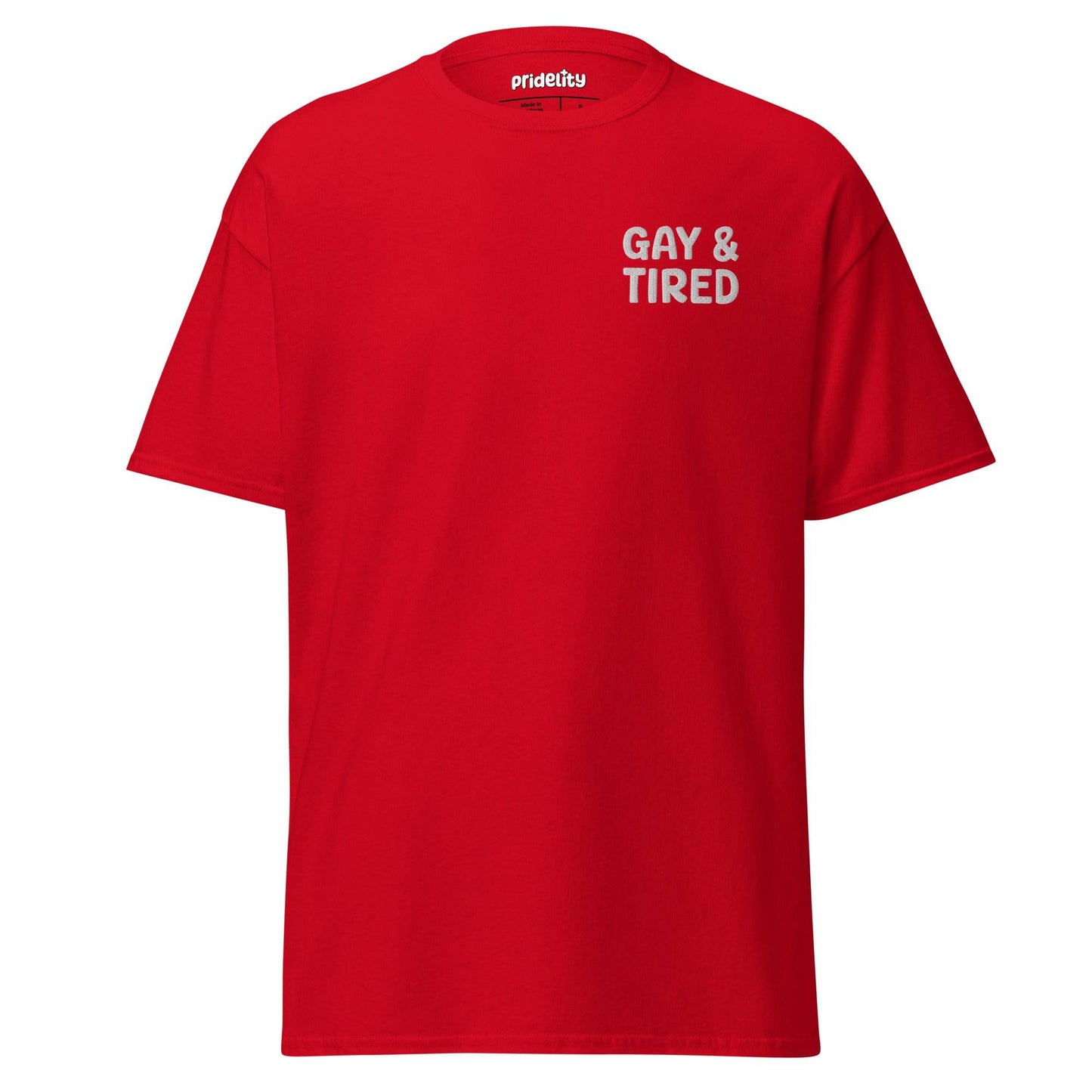 Pridelity's Gay & Tired T-Shirt, available in black, showcases the phrase "GAY & TIRED" in white letters on the upper left side of the front.