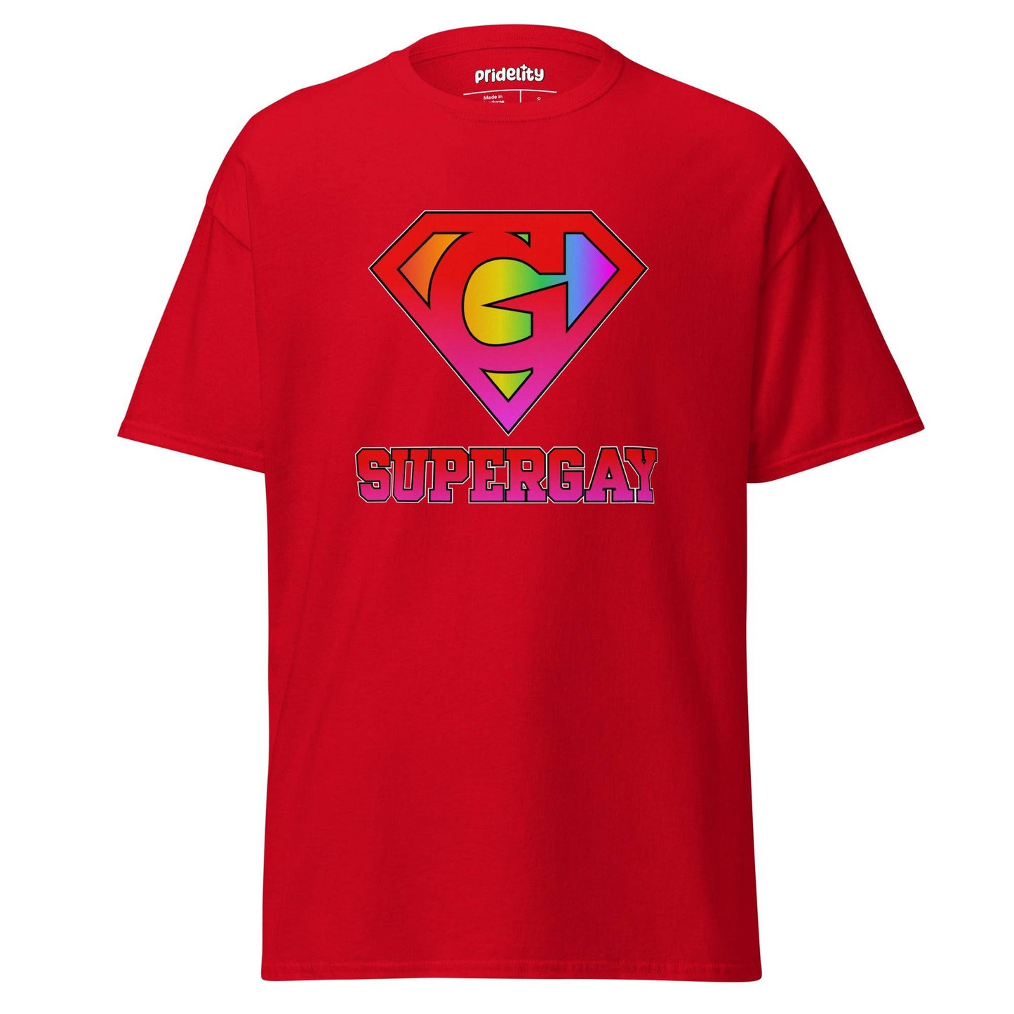 Pridelity's SuperGay T-Shirt in red showcases a rainbow-colored "S" symbol with arrows, reminiscent of the Superman logo, and prominently displays the word "SUPERGAY" underneath in large, bold letters.