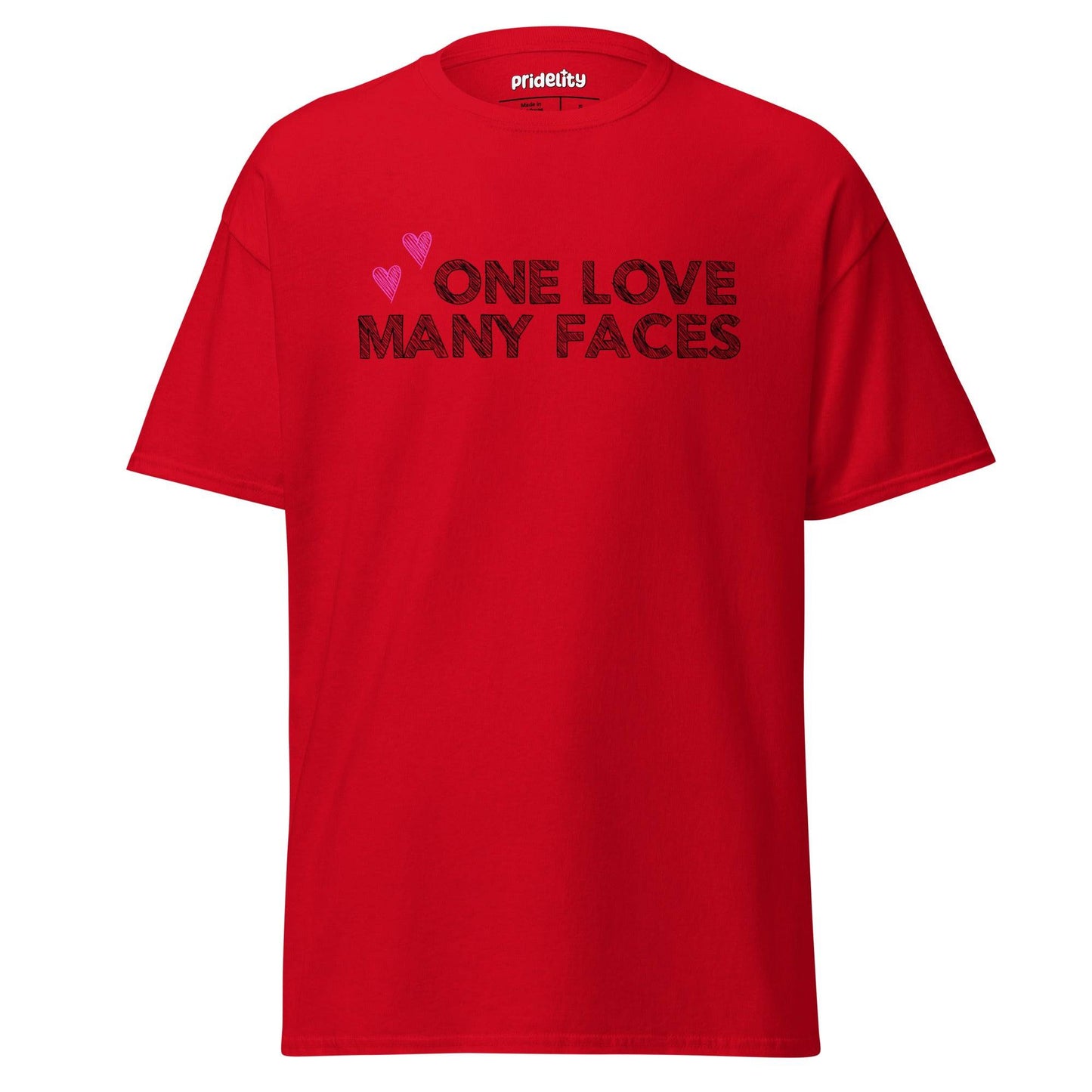 The One Love T-Shirt by Pridelity is a natural-colored pride shirt prominently displaying the message "One Love Many Faces" in bold black letters, complemented by two pink hearts above. It stands out elegantly against a simple white background, celebrating unity and diversity in style.