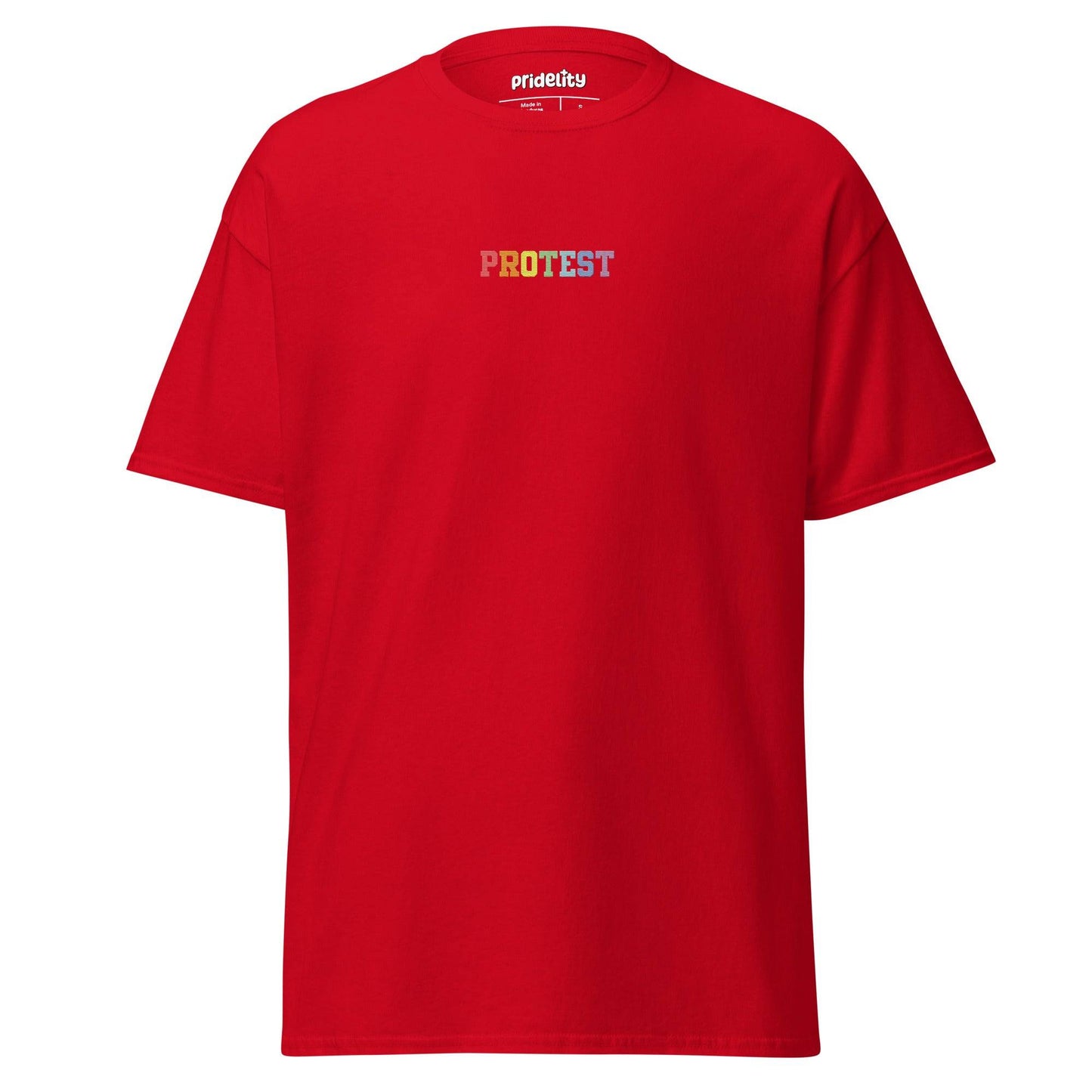 The Protest T-Shirt by Pridelity is a bold black garment featuring the word "PROTEST" displayed prominently in vibrant rainbow-colored letters on the chest, set against a plain white background.