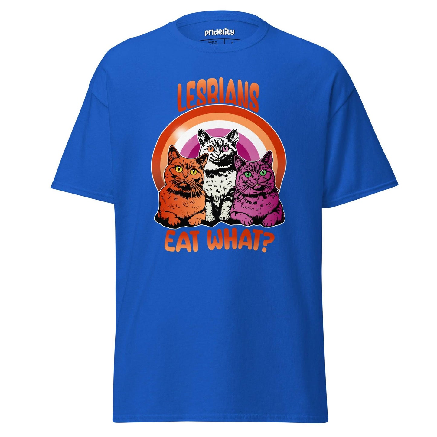 Introducing the Pridelity "Lesbians Eat What T-Shirt," a black pride shirt showcasing vibrant artwork of three cats seated in front of a rainbow with the bold, humorous text "LESBIANS EAT WHAT?
