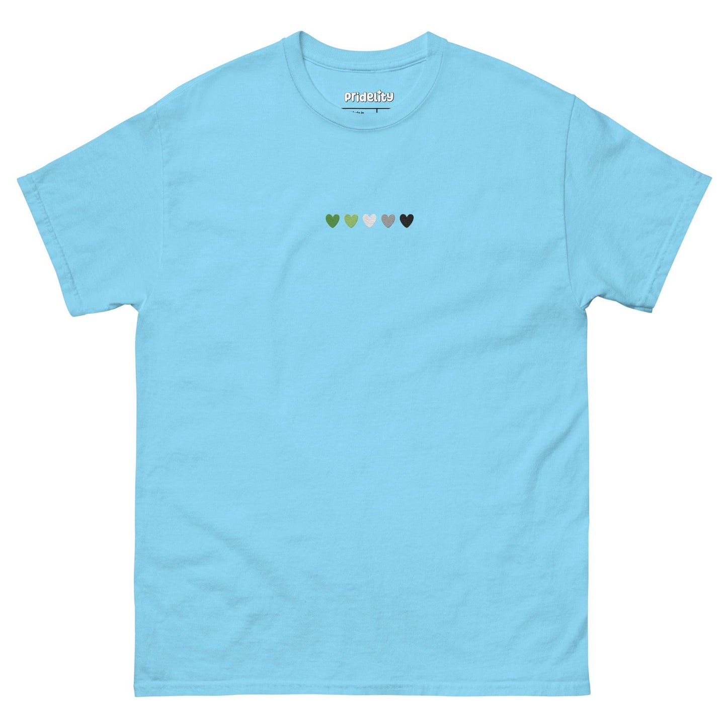The Aromantic Love T-Shirt by Pridelity is cream-colored and features a row of small hearts across the chest in green, light green, white, gray, and black.