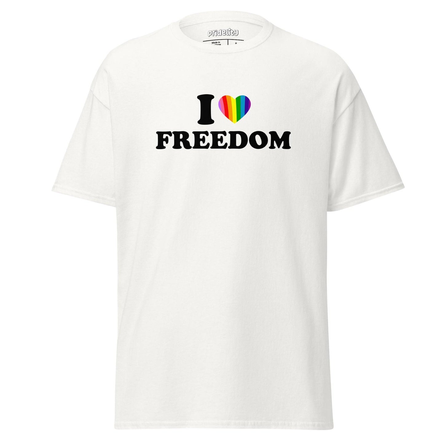 The "I Love Freedom T-Shirt" by Pridelity features a beige design with the bold message "I ❤️ FREEDOM," showcasing a heart symbol vibrantly adorned in rainbow colors, making it an ideal pride shirt.