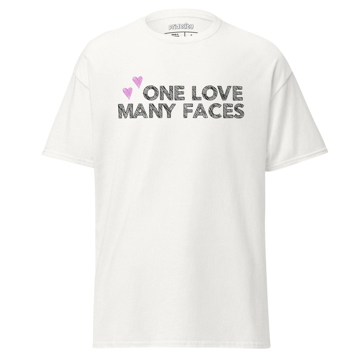 The One Love T-Shirt by Pridelity is a natural-colored pride shirt prominently displaying the message "One Love Many Faces" in bold black letters, complemented by two pink hearts above. It stands out elegantly against a simple white background, celebrating unity and diversity in style.