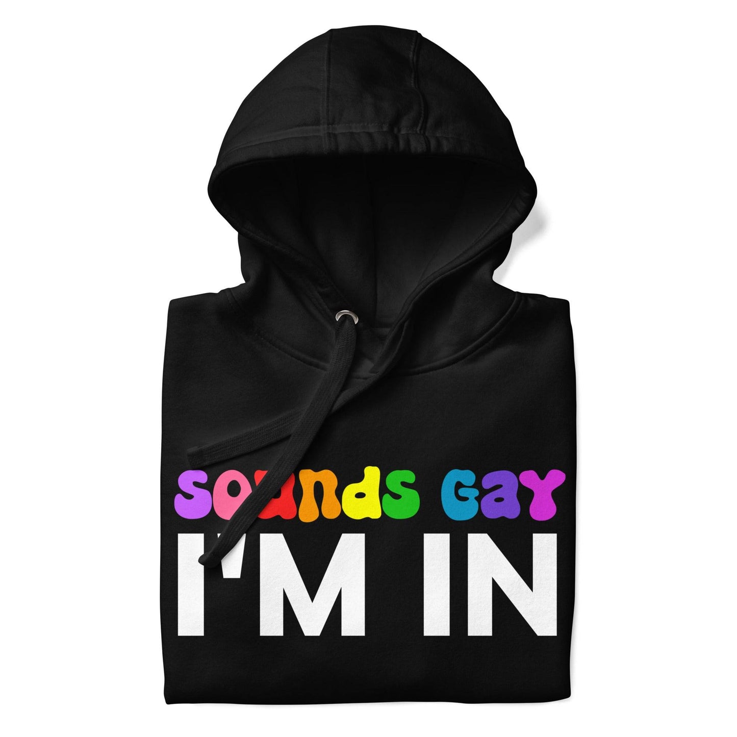 This black Sounds Gay Hoodie from Pridelity's pride collection boldly features the phrase "Sounds Gay I'm In." The words "Sounds Gay" are illuminated in vibrant, multicolored letters, while "I'm In" is highlighted in bold white. Complete with a front pocket and a drawstring hood, this hoodie celebrates LGBTQ+ pride with both style and comfort.