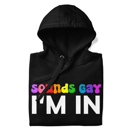 This black Sounds Gay Hoodie from Pridelity's pride collection boldly features the phrase "Sounds Gay I'm In." The words "Sounds Gay" are illuminated in vibrant, multicolored letters, while "I'm In" is highlighted in bold white. Complete with a front pocket and a drawstring hood, this hoodie celebrates LGBTQ+ pride with both style and comfort.