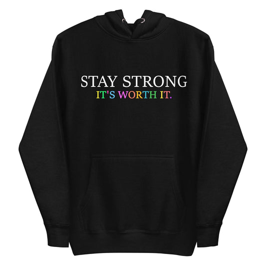 Introducing the "Stay Strong Hoodie" from Pridelity! This black hoodie, part of the pride collection, features a striking design with "STAY STRONG" in white and "IT'S WORTH IT" in vibrant, colorful letters on the front. It's the perfect way to show your support while adding a splash of LGBTQ+ pride to your wardrobe.