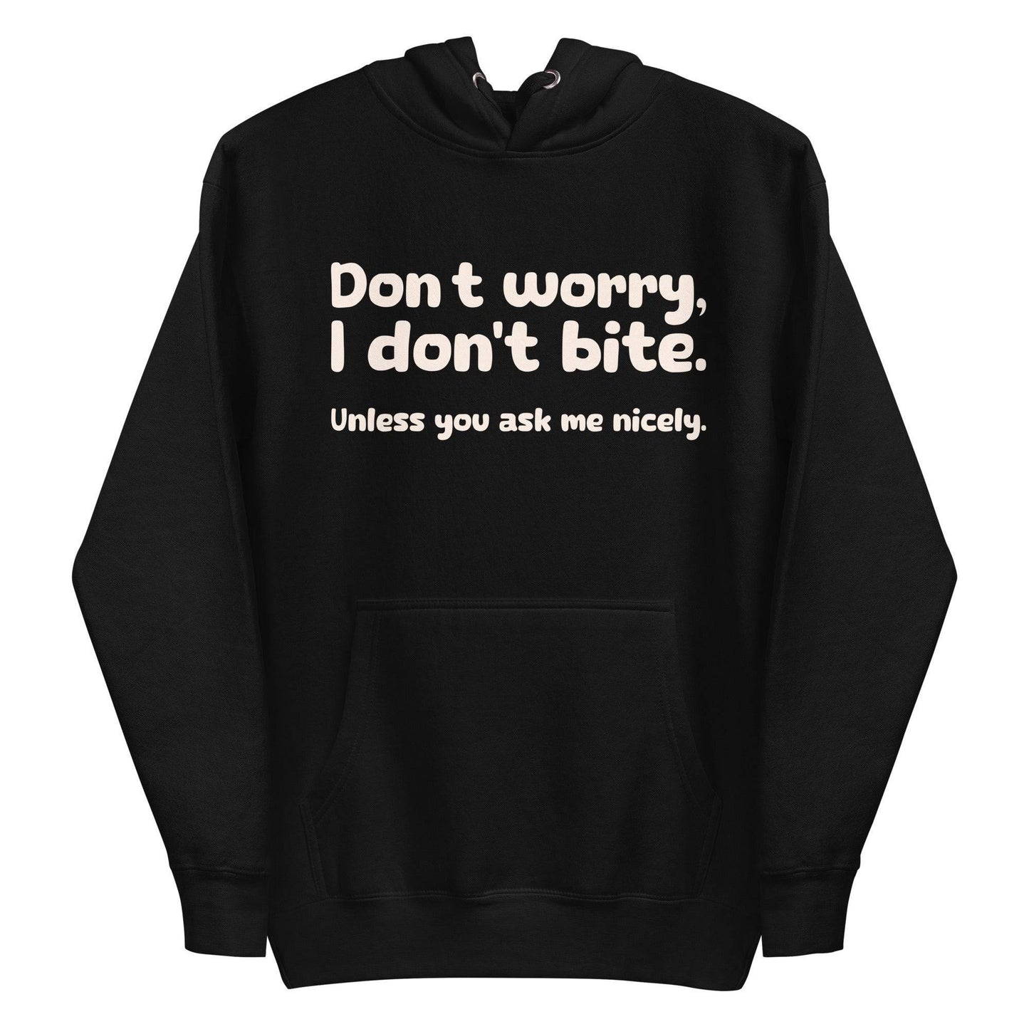 Introducing the Pridelity "I Don't Bite" Hoodie in pink, featuring bold white text on the front that reads, "Don't worry, I don't bite. Unless you ask me nicely." Perfect for those who embrace humor and identity with style.