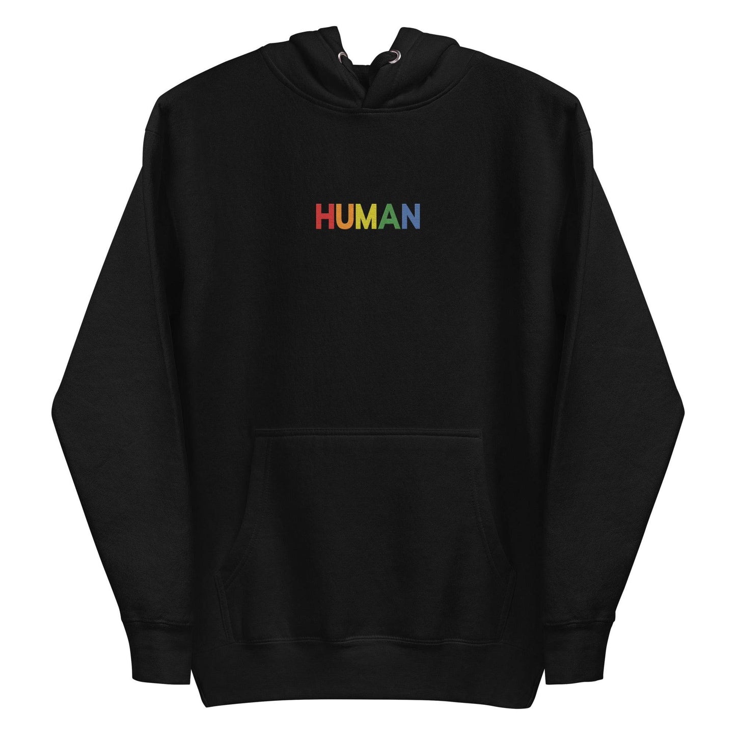 A folded Pridelity Human Hoodie, showcasing a crisp white design with "HUMAN" embroidered in vibrant rainbow colors on the front. The hood is laid flat, with its drawstrings visible, celebrating individuality and self-expression.