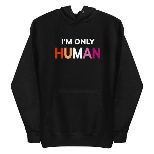 Introducing the "I'm Only Human" Hoodie by Pridelity, designed in sleek black with a front pocket. It proudly displays the text "I'M ONLY HUMAN" in a striking gradient of white, orange, and pink, making it a stylish addition that perfectly captures the essence of pride apparel.