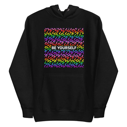 Introducing the Be Yourself Hoodie by Pridelity: a black hoodie adorned with a vibrant square pattern and the uplifting message "LOVE YOURSELF" in rainbow colors repeated inside. This striking piece of Pride merch is sure to stand out, making it an ideal addition to any Pride collection with its emphasis on positivity.