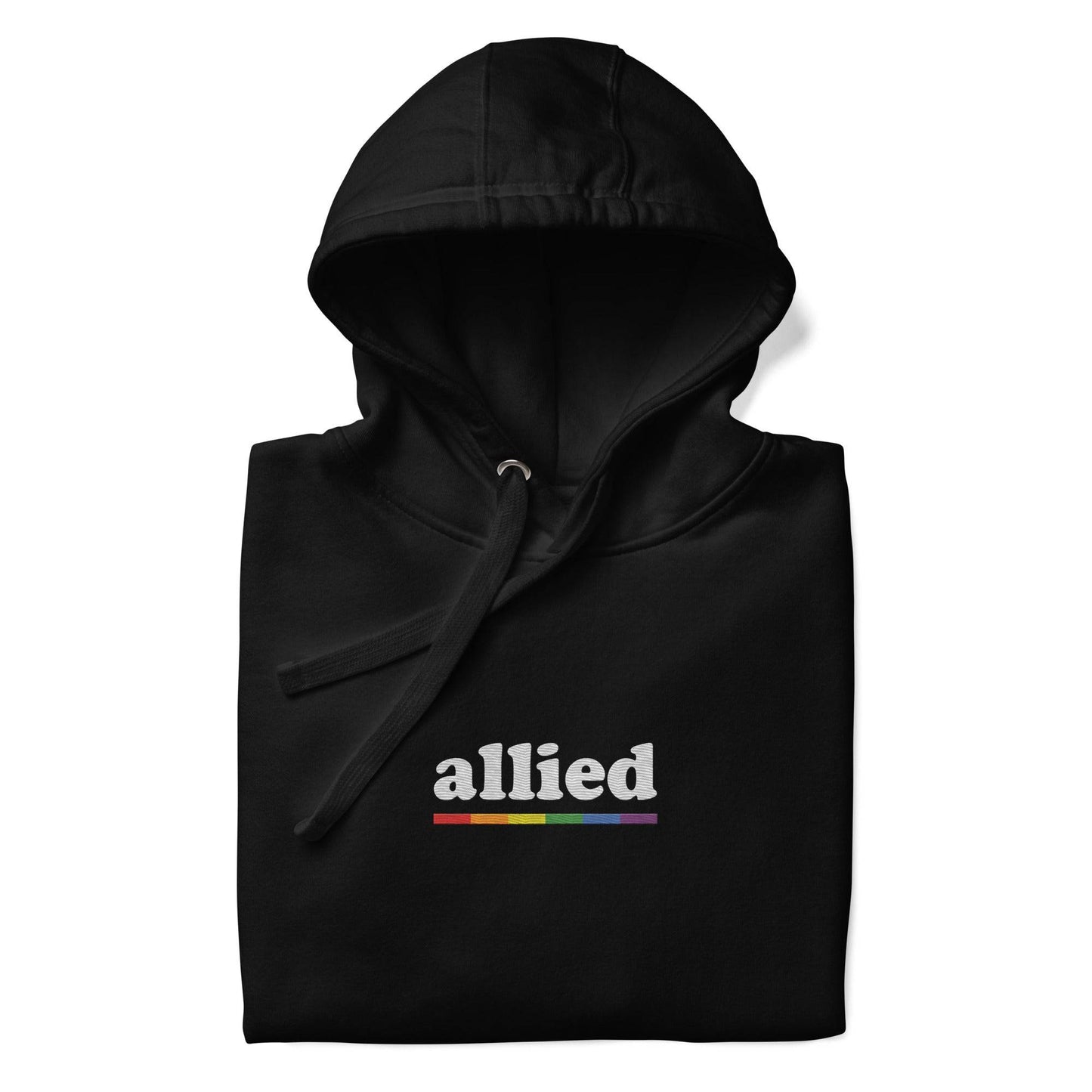 The Allied Hoodie by Pridelity is a black hoodie adorned with the word "allied" in white text across the chest, accompanied by a vibrant horizontal rainbow stripe below. This piece of Pride Merch features a front pocket and a drawstring hood, effortlessly combining comfort with meaningful expression.