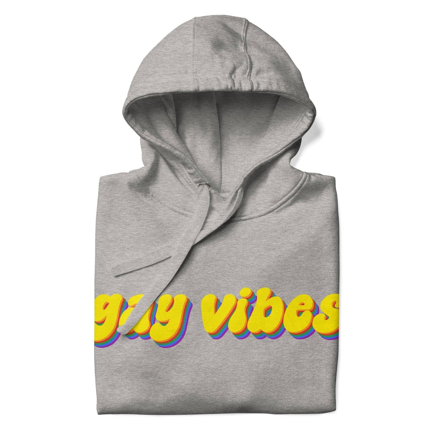 A Carbon Grey Gay Vibes Hoodie by Pridelity features the phrase "gay vibes" displayed in bold, colorful 3D-style yellow and purple text across the chest.