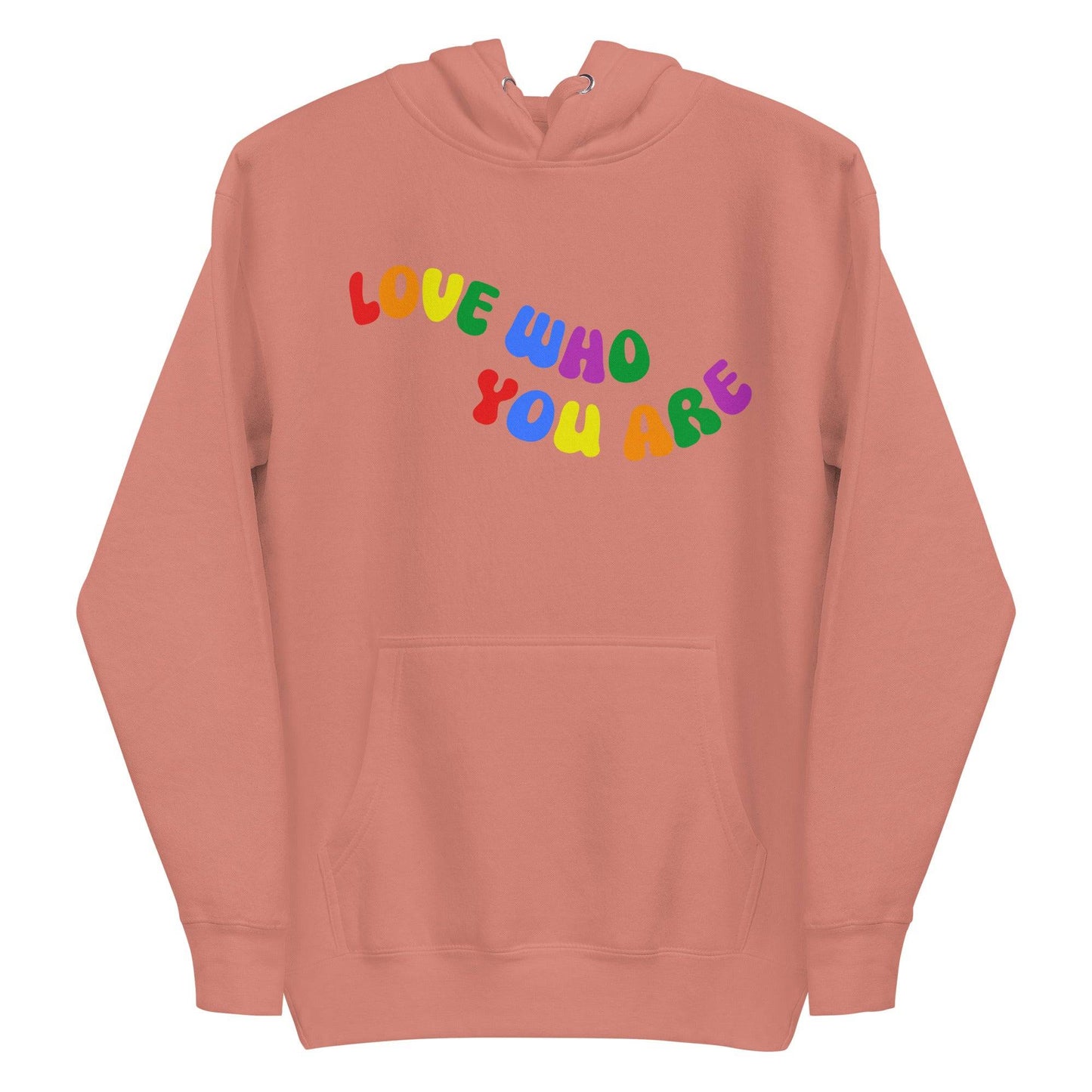 A folded Pridelity Love Who You Are Hoodie in white features vibrant, rainbow-colored text that boldly showcases the message "LOVE WHO YOU ARE" across the front. This design captures the spirit of pride apparel, honoring individuality and self-love through its colorful display.