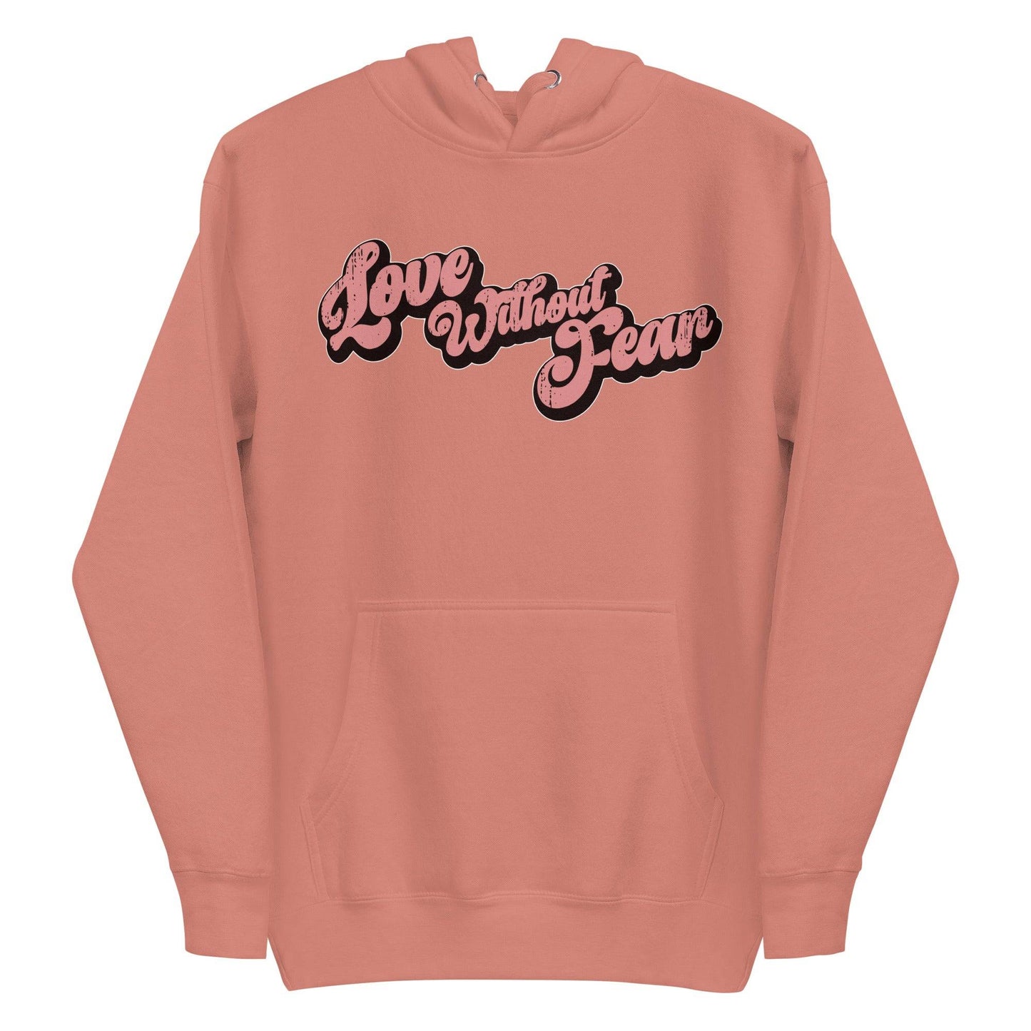 The Love Without Fear Hoodie by Pridelity comes in a dusty rose hue, featuring the phrase "Love Without Fear" across the front in a stylized, bold script reminiscent of classic pride shirts. The vintage text has contrasting black outlines and is centered on the chest. This hoodie also includes a front pocket and drawstrings.