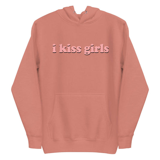 The "I Kiss Girls" Hoodie by Pridelity is a pride celebration in dusty rose, featuring bold, light pink lettering on the front, along with a convenient front pocket and drawstring hood.
