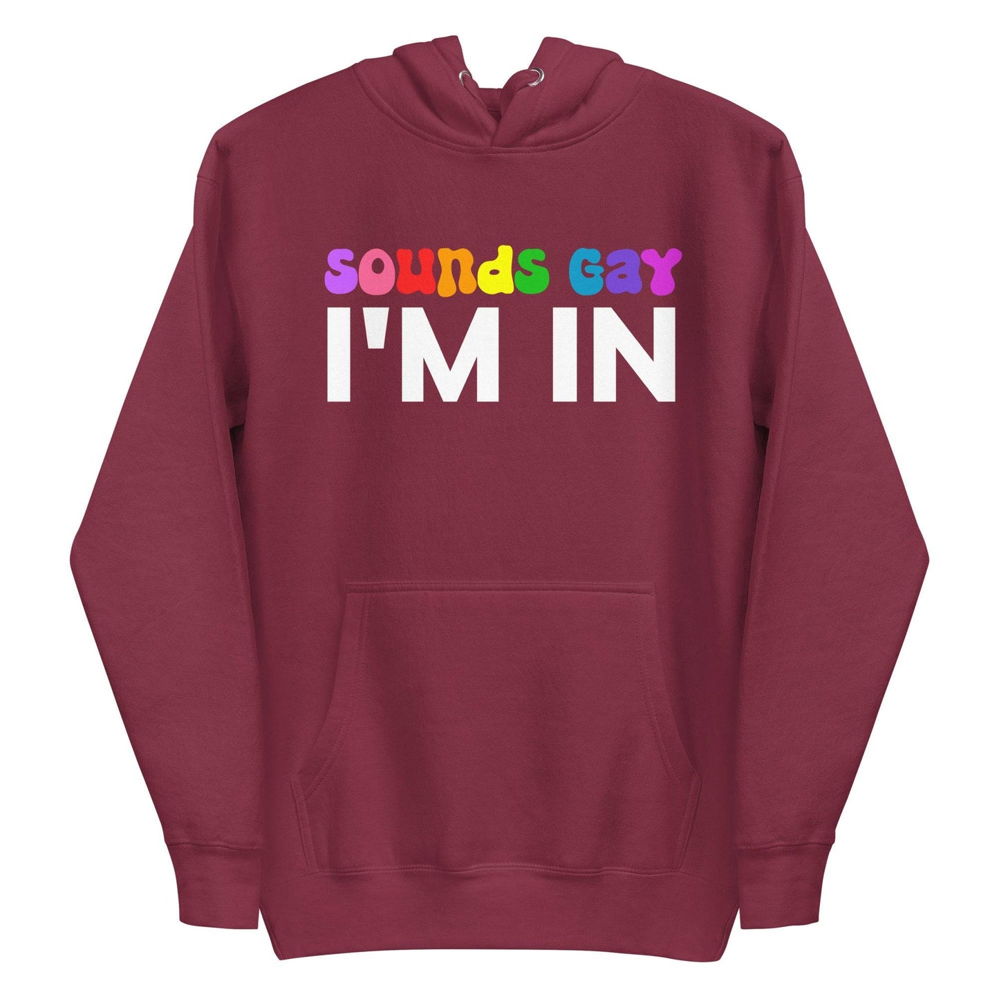 This black Sounds Gay Hoodie from Pridelity's pride collection boldly features the phrase "Sounds Gay I'm In." The words "Sounds Gay" are illuminated in vibrant, multicolored letters, while "I'm In" is highlighted in bold white. Complete with a front pocket and a drawstring hood, this hoodie celebrates LGBTQ+ pride with both style and comfort.