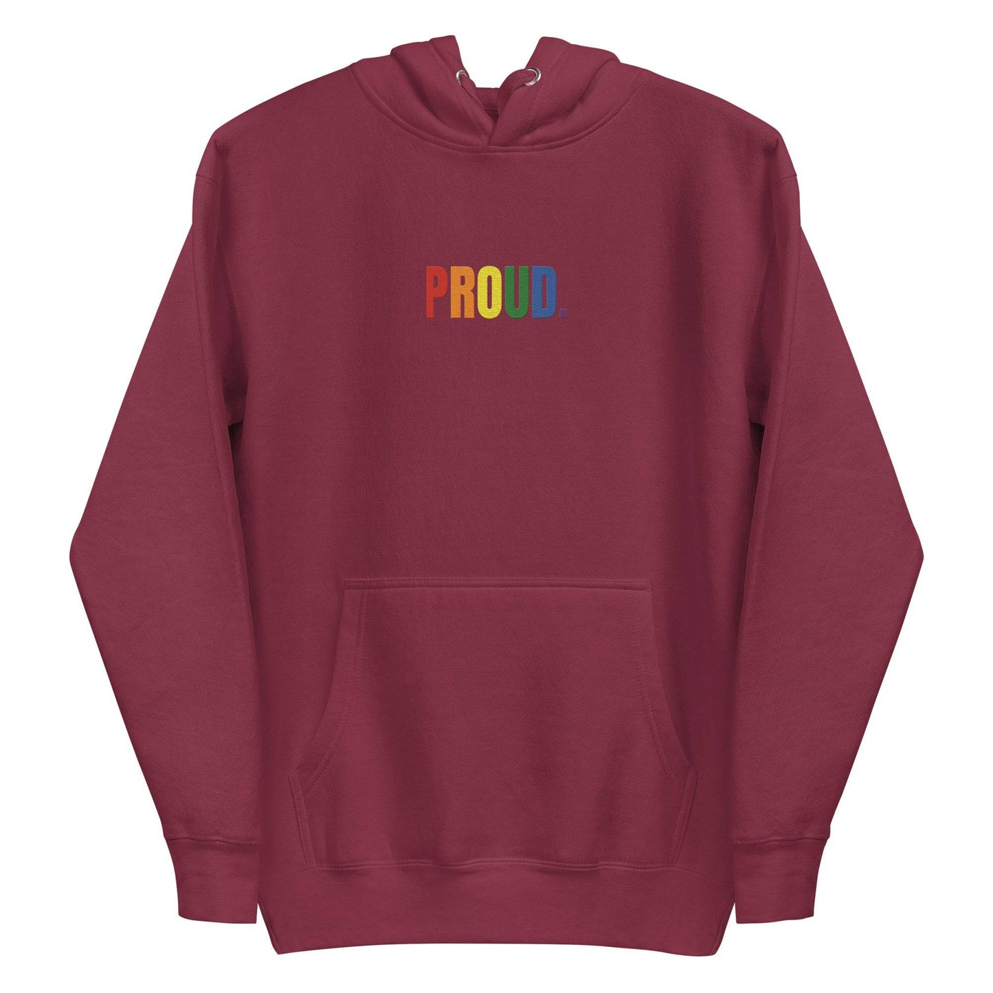 The Proud Hoodie by Pridelity is a white hoodie featuring "PROUD." in vibrant rainbow colors on the front, capturing the essence of pride shirts. It includes a convenient front pocket and an adjustable drawstring hood.