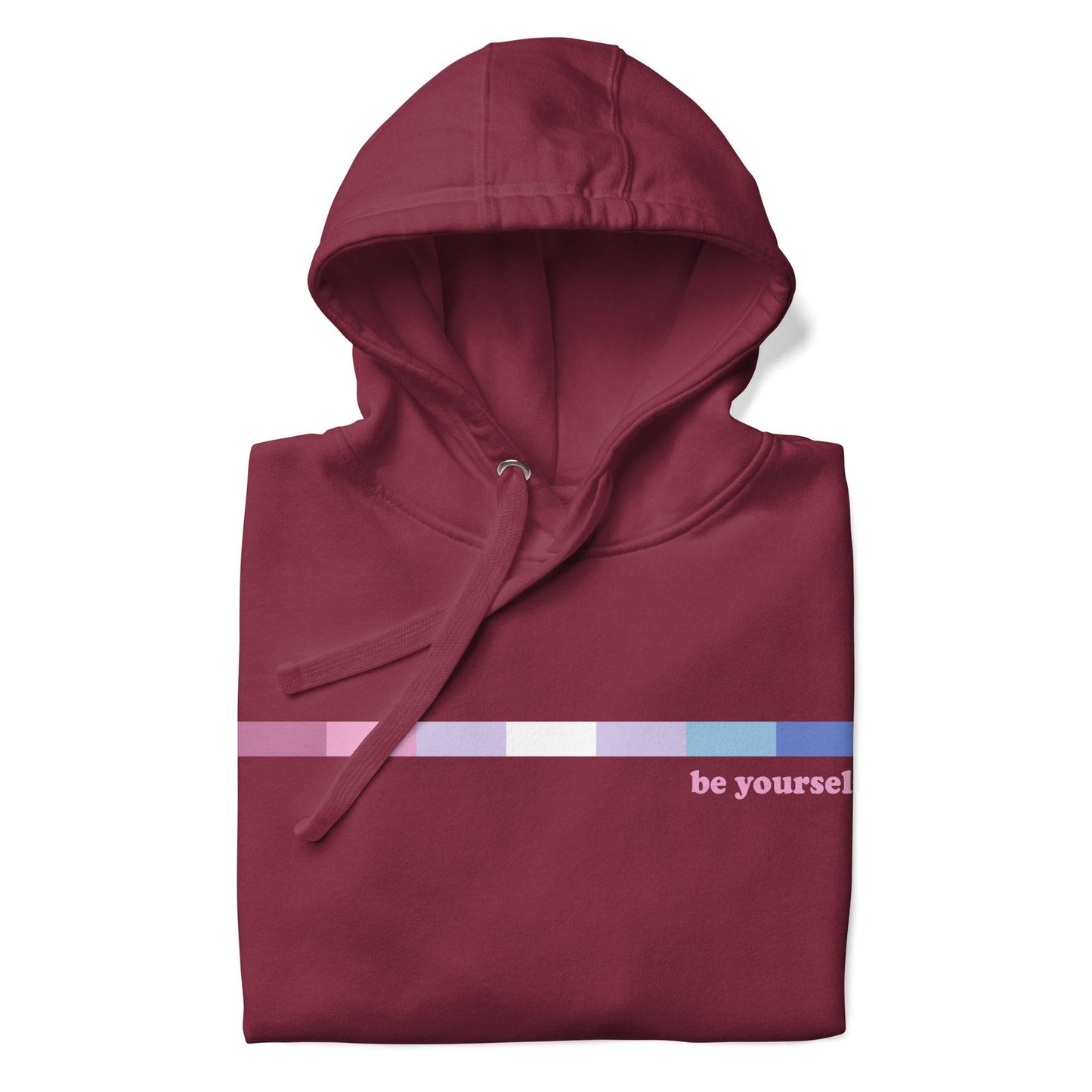 Introducing the Bigender Hoodie from Pridelity's Pride Collections, available in maroon. This hoodie showcases a front pocket and a beautiful horizontal gradient in pink and purple shades, with the phrase "be yourself" elegantly displayed in white on the right side of the chest.