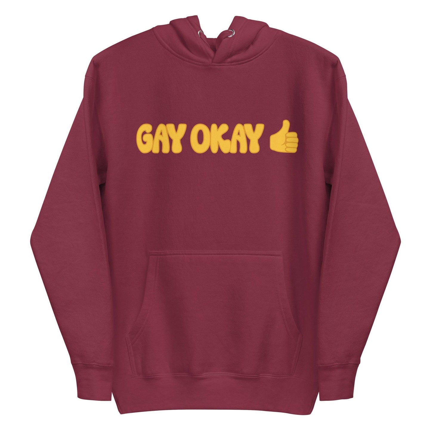 Introducing the Gay Okay Hoodie by Pridelity, a white pride hoodie showcasing "GAY OKAY" in bold yellow bubble letters on the front. It features a delightful yellow thumbs-up emoji and is designed with a cozy front pocket and adjustable drawstrings, making it perfect for celebrating identity and style.
