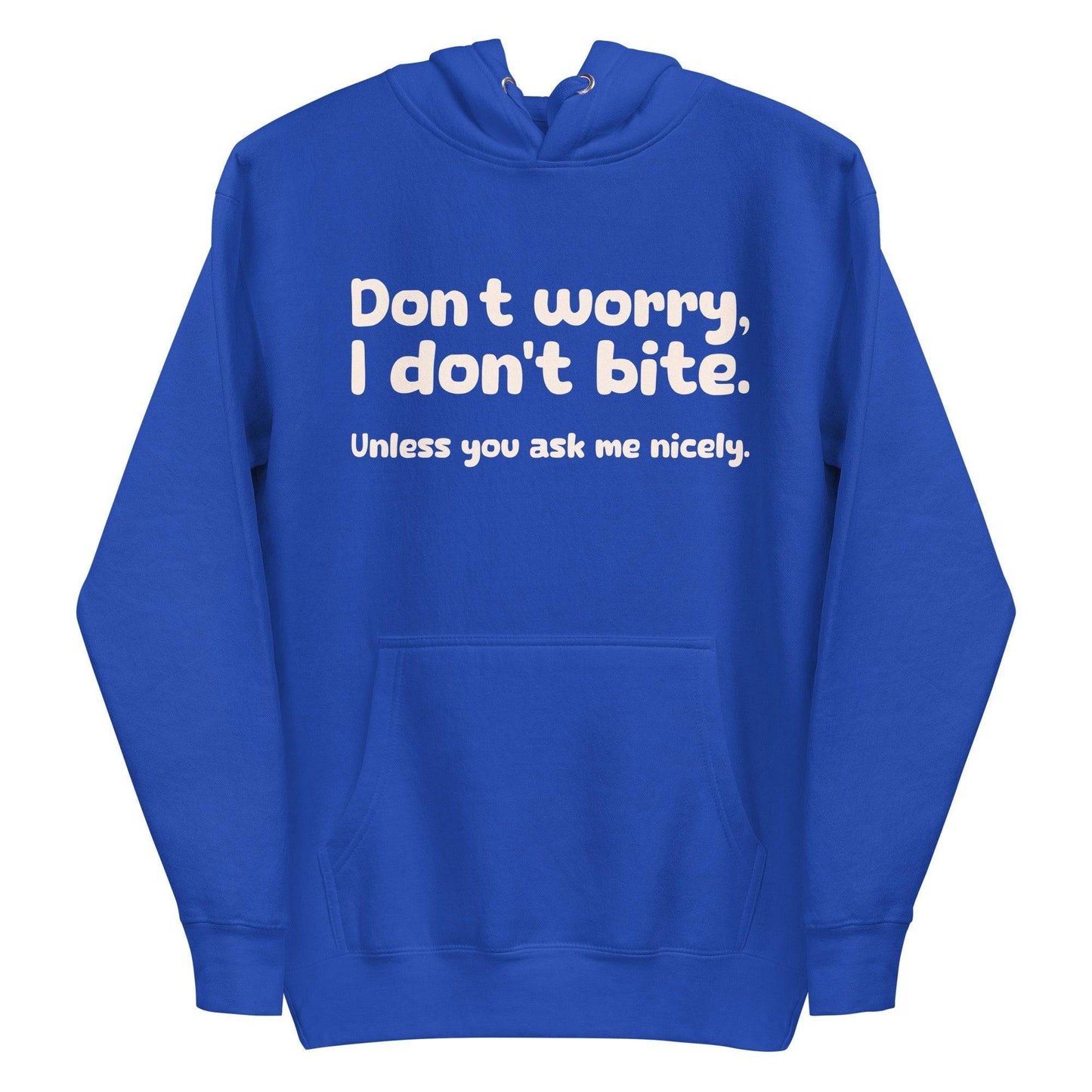 Introducing the Pridelity "I Don't Bite" Hoodie in pink, featuring bold white text on the front that reads, "Don't worry, I don't bite. Unless you ask me nicely." Perfect for those who embrace humor and identity with style.
