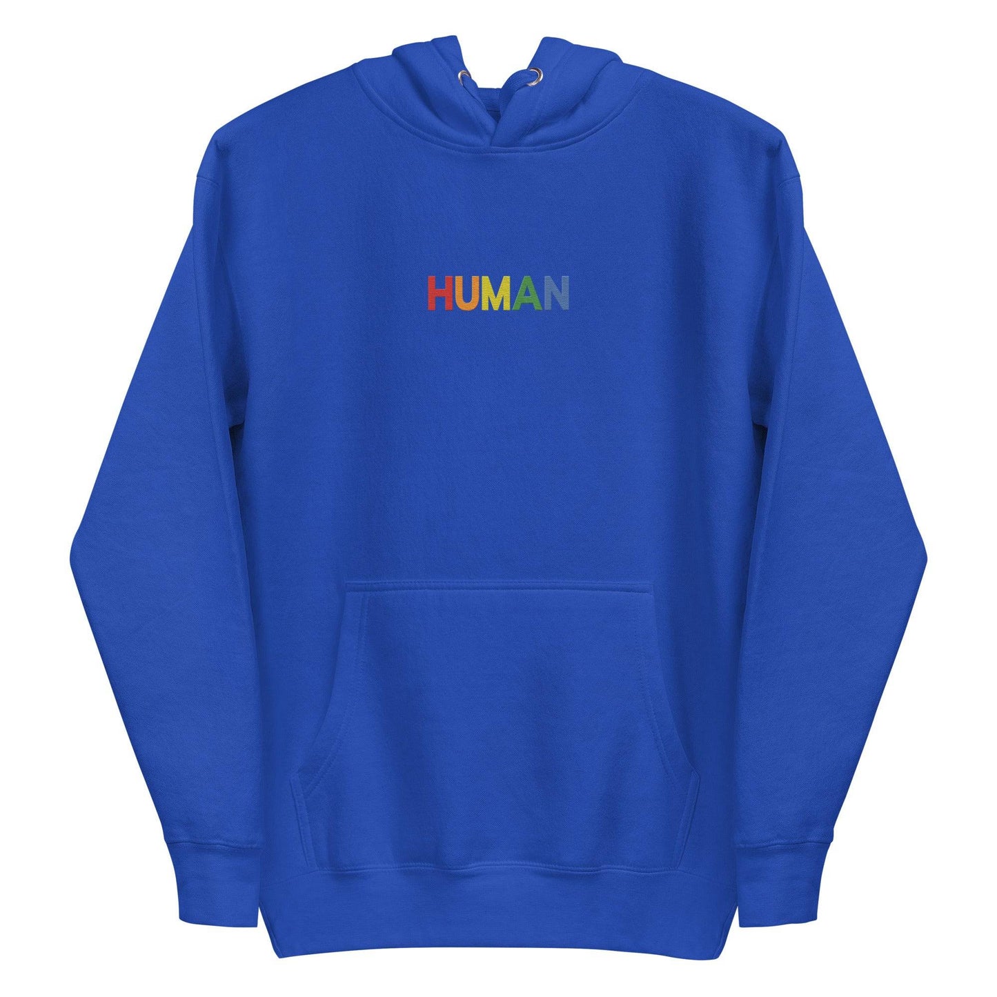 A folded Pridelity Human Hoodie, showcasing a crisp white design with "HUMAN" embroidered in vibrant rainbow colors on the front. The hood is laid flat, with its drawstrings visible, celebrating individuality and self-expression.